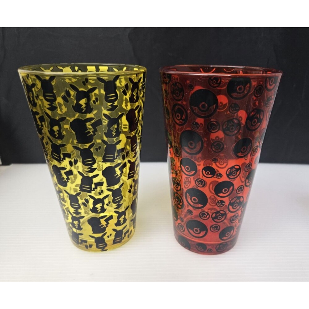 JUST FUNKY Pokemon Pikachu Pokeball Pint Glasses Yellow & Red Set of 2 HTF 2016